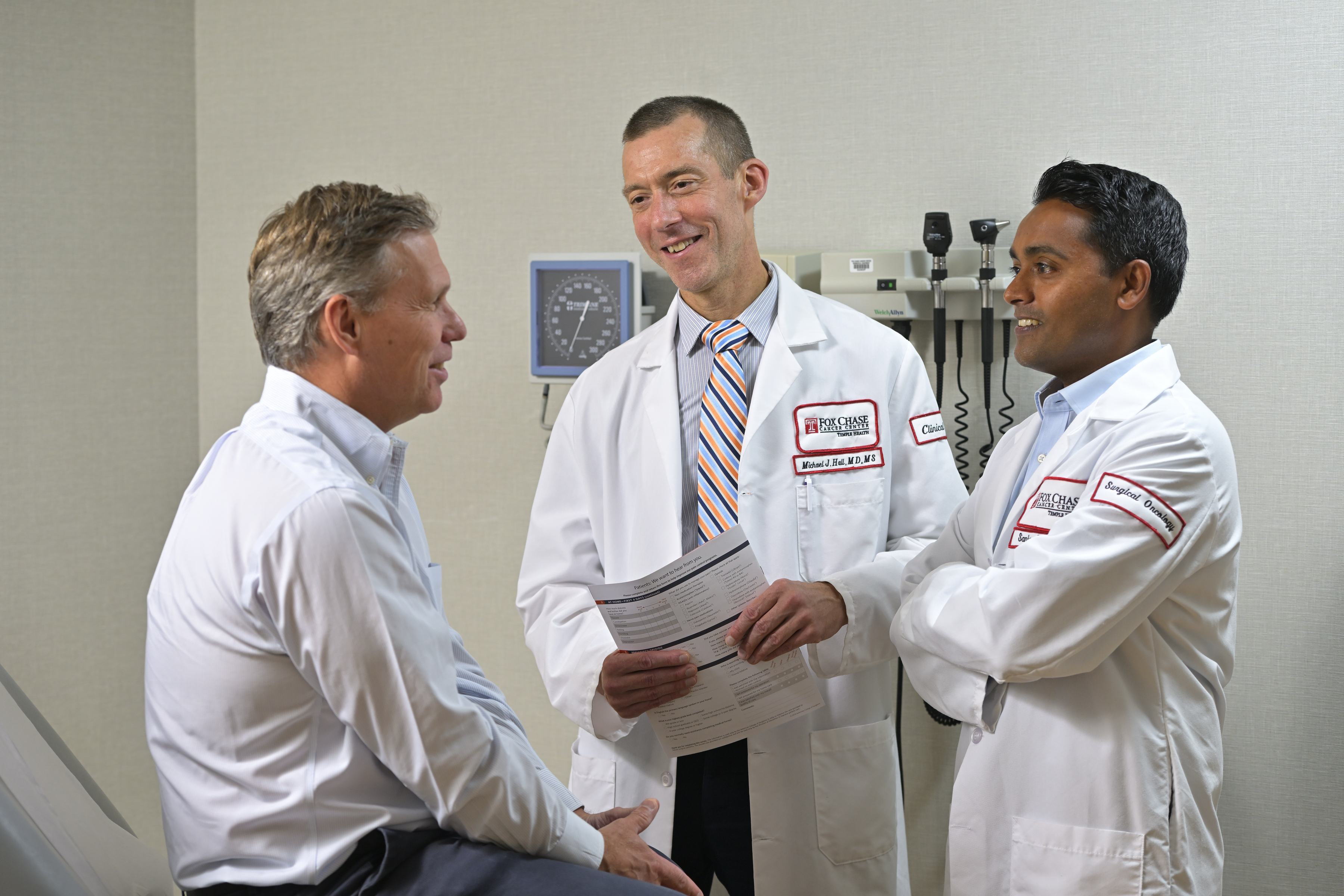 Dr. Hall and Dr. Reddy with patient 