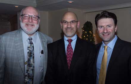 A photograph of Dr. Richard Greenberg, Dr. Robert Uzzo, and Dr. Alexandar Kutikov standing next to each other and smiling at the camera.