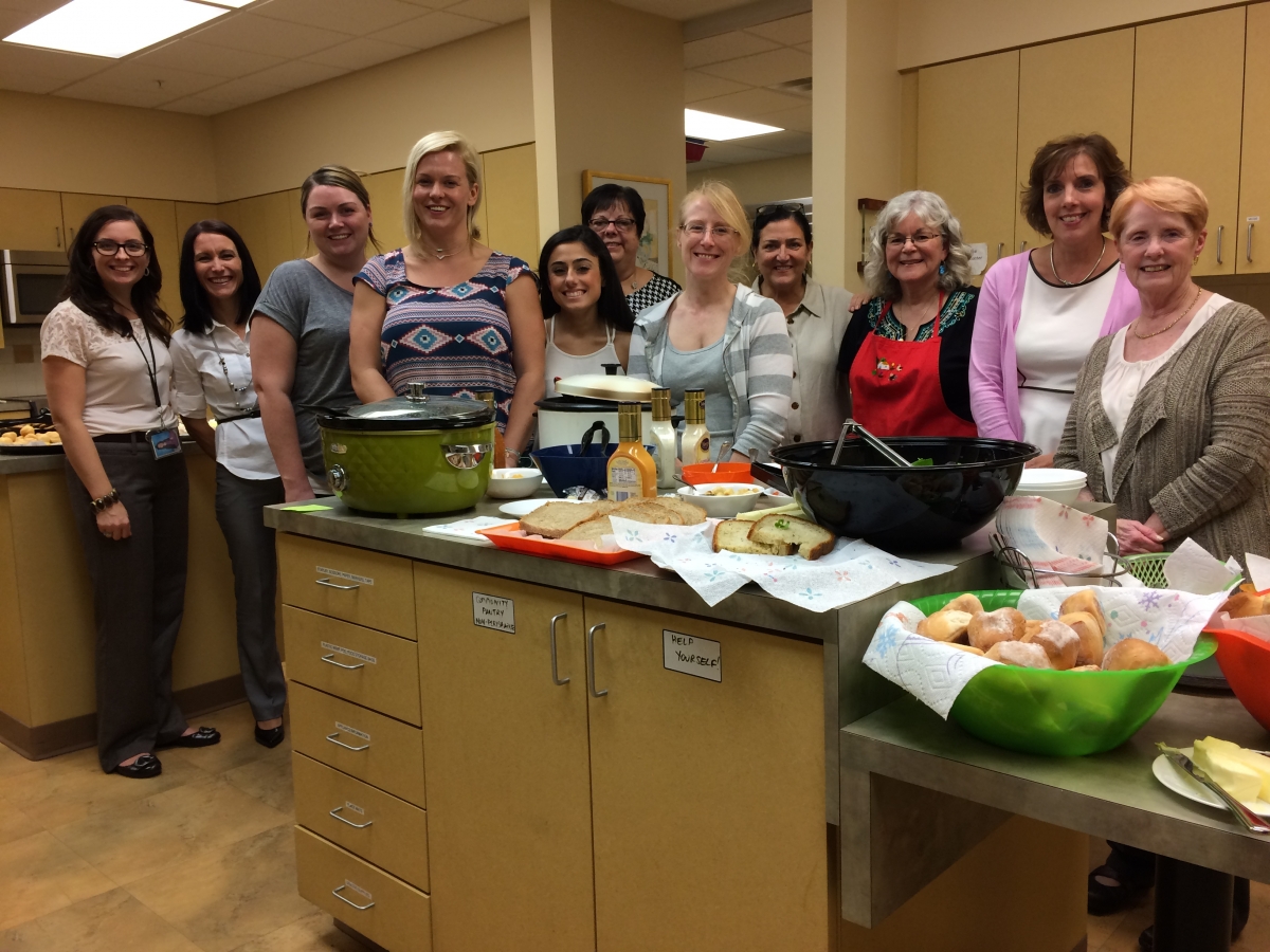 Fox Chase nurses preparing dinner for patients staying at the Hope Lodge 