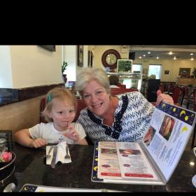Link to /sites/default/files/styles/patient_story/public/images/patient-stories/Fowler%20with%20granddaughter%20at%20resturant.jpg?h=4ec91401&itok=19_ksnRr