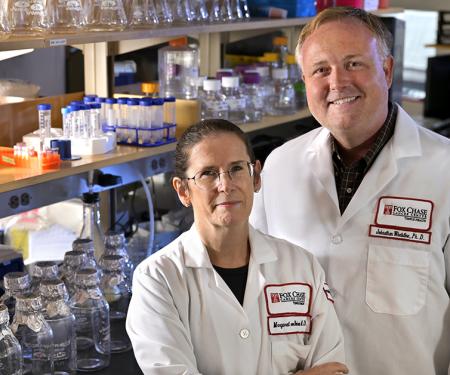 Dr. von Mehren and Dr. Whetstine standing in a laboratory