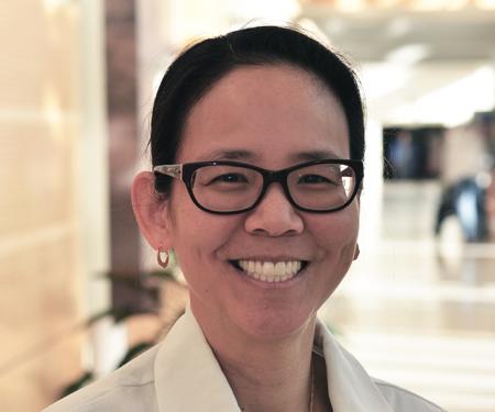 A portrait shot of a Fox Chase doctor, smiling at the camera.